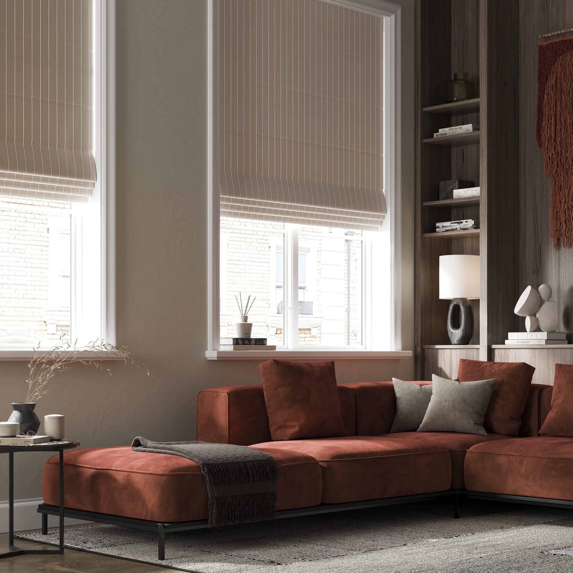 Wide view of striped cream roman blinds across tall living room windows