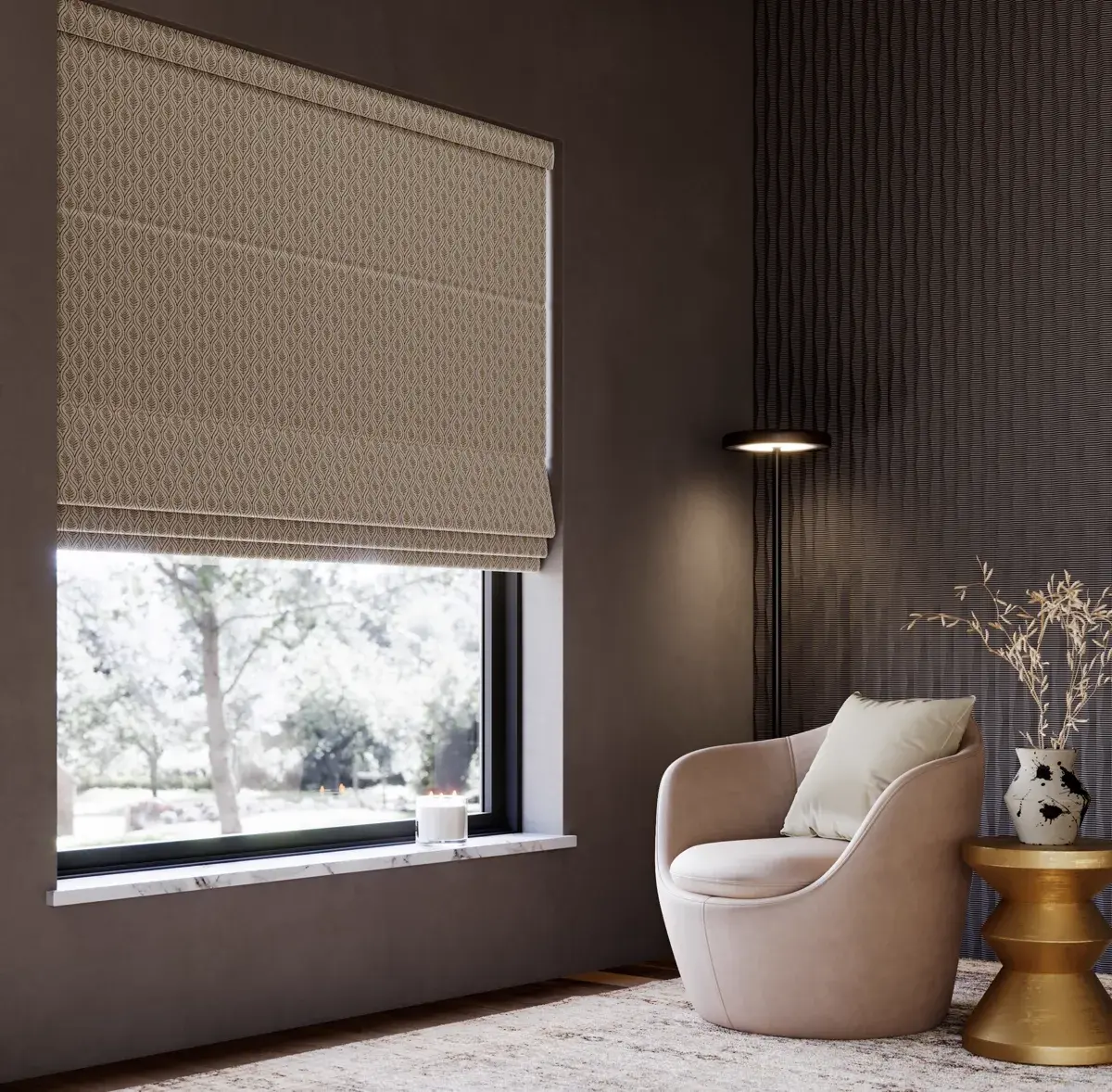 Patterned roman blind in a moody reading nook with an armchair and floor lamp